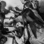 Volunteer interacting with children during a childcare and teaching placement abroad